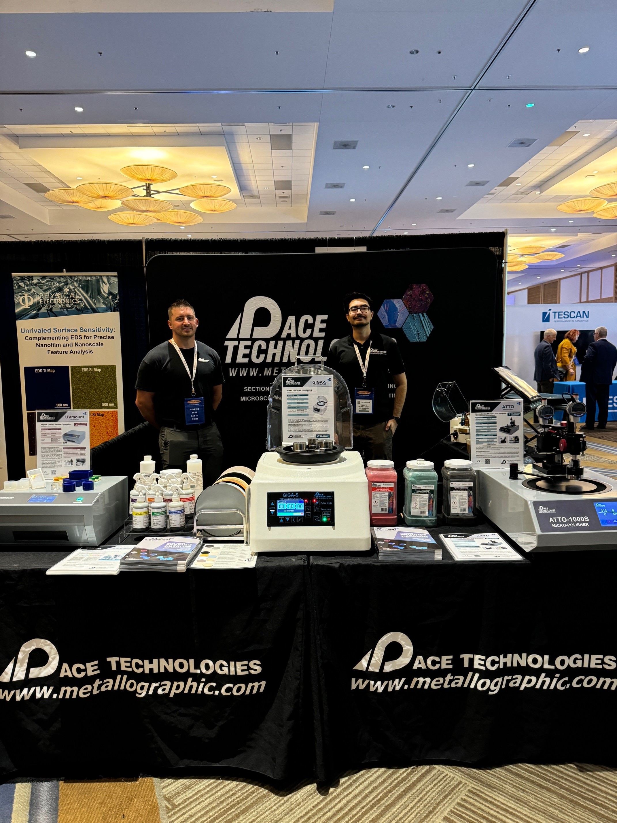 PACE Technologies trade show booth display with equipment demonstrations