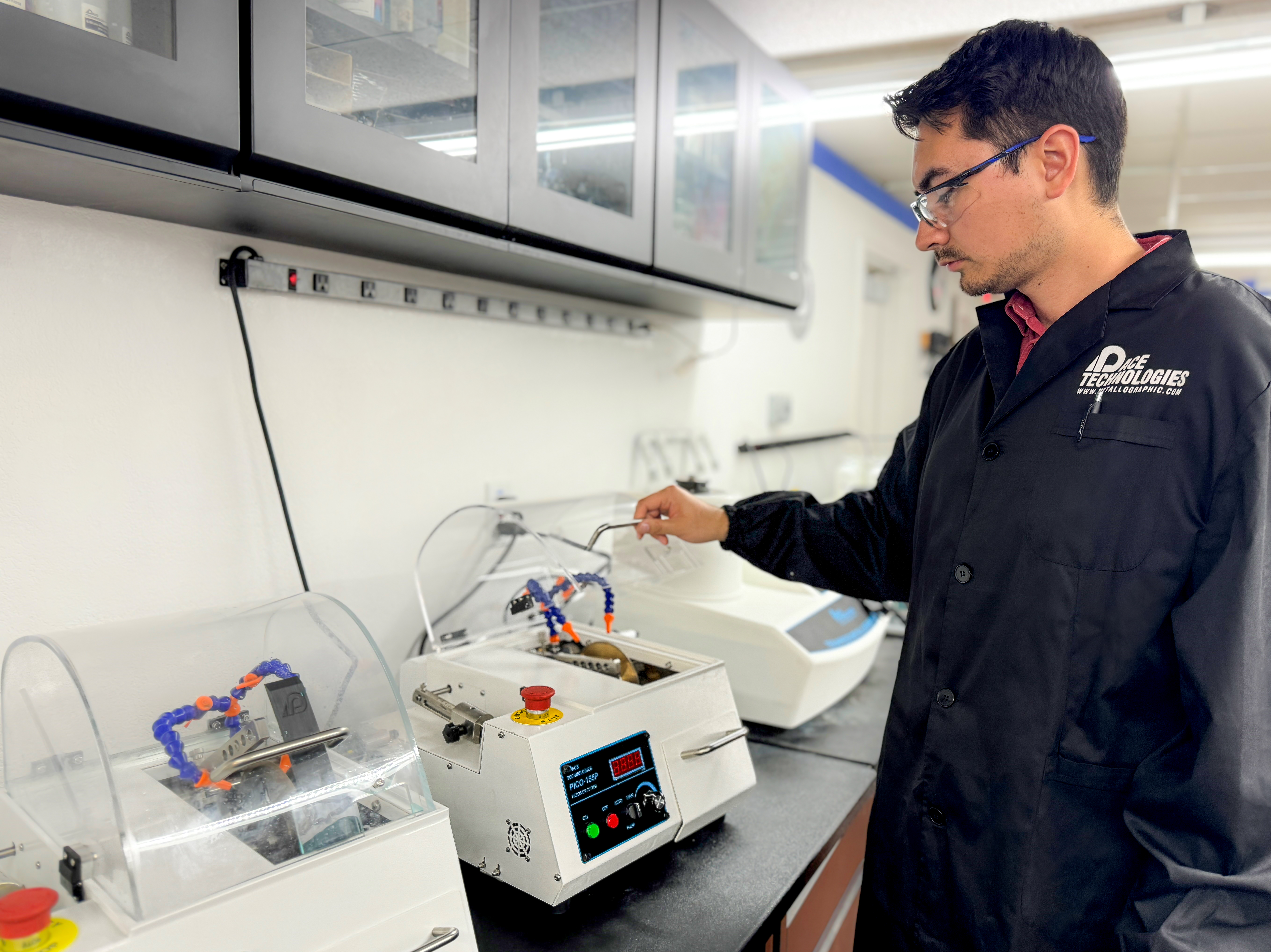 Metallographic laboratory with technicians operating equipment
